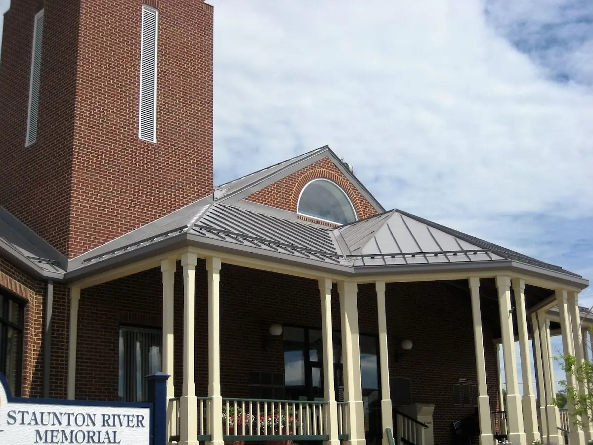Skilled roofing craftsmen working on a residential roof in Nacogdoches